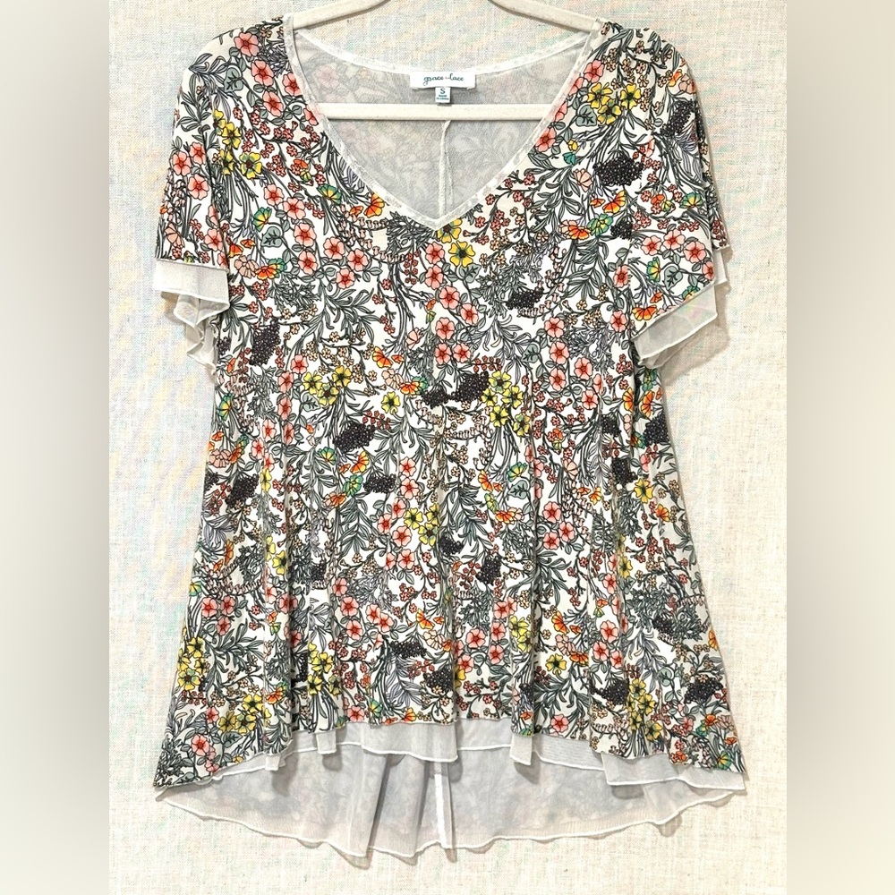 Grace & Lace White Floral V-Neck Asymmetrical with Pink, Yellow & Green Accents